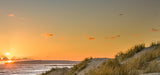 orange sunset in the dunes at camber