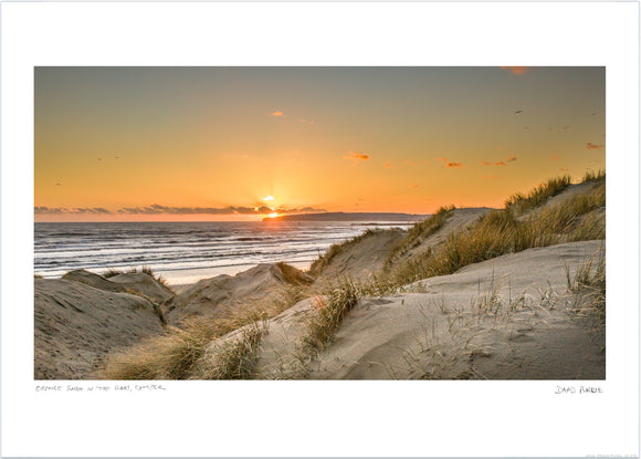 orange sunset in the dunes at camber