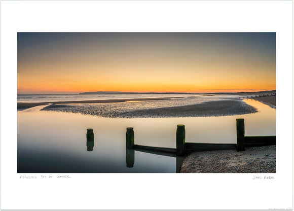 refleted sunset sky at camber